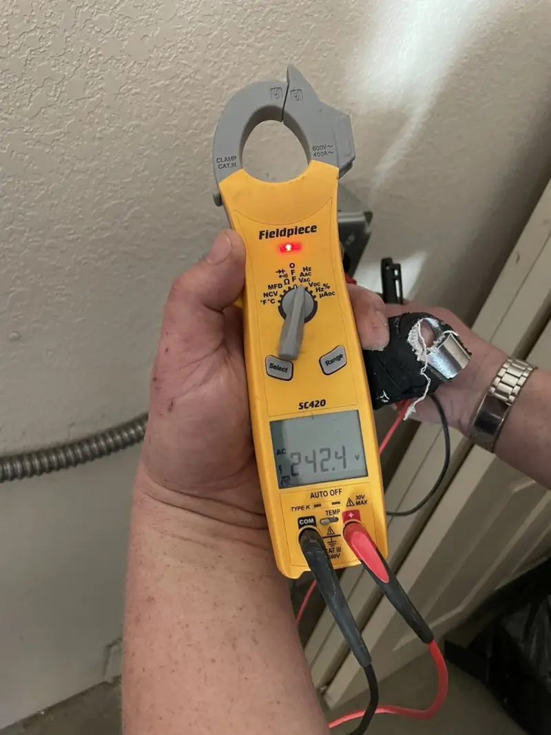 Voltage testing with clamp meter during Aluminum Wiring Replacement in Osage